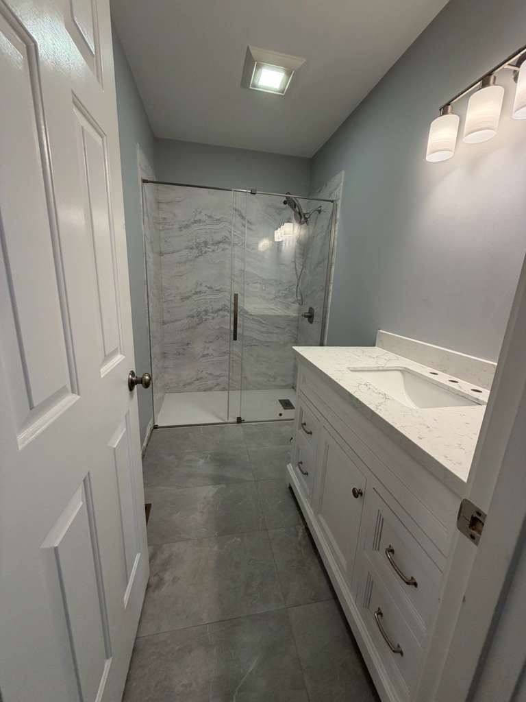 Finished bathroom remodel with new tile shower